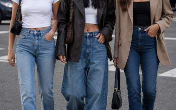 Why are high-waisted jeans popular?