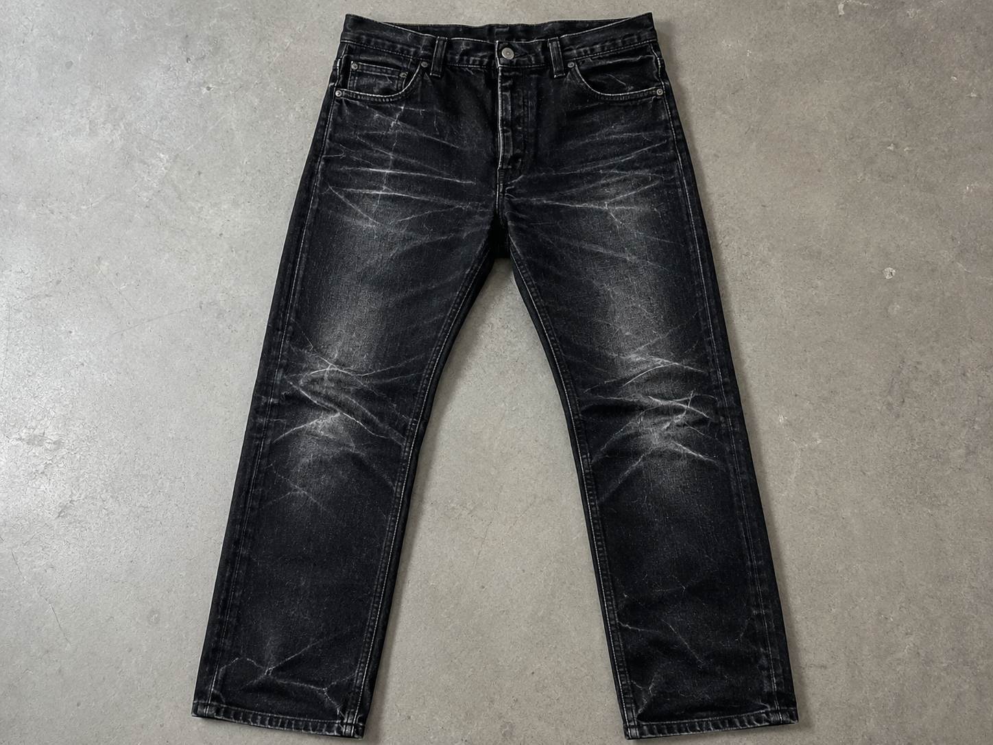 White lines on black jeans usually come from residue, abrasion, or fading. Detergent residue looks powdery or surface-level, while true fading follows seams, 