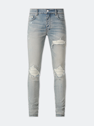Custom designed distressed jeans with holes