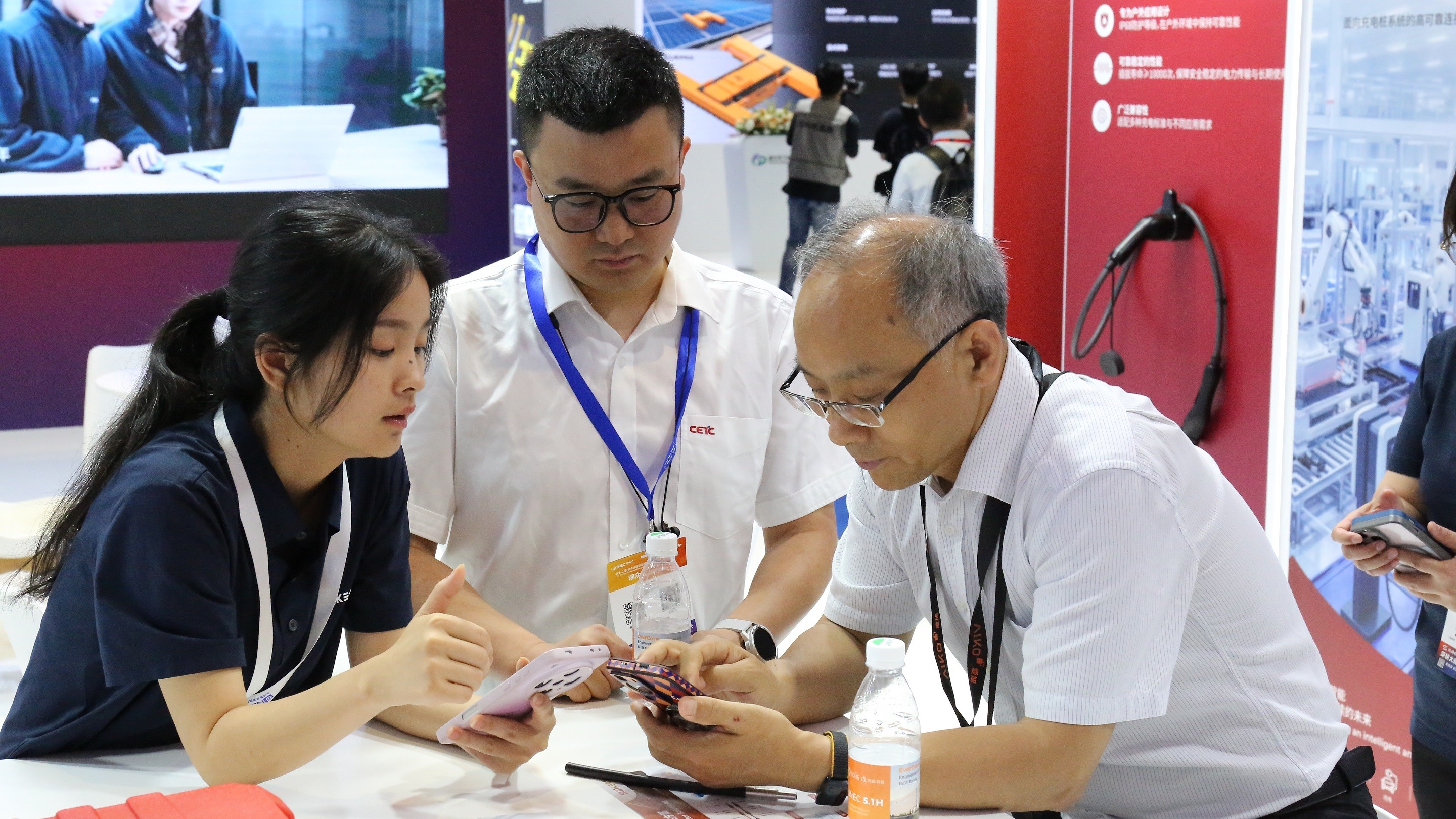 Overview of SUNKEAN booth displaying PV, energy storage, EV charging, and AI cable solutions at SNEC Shanghai