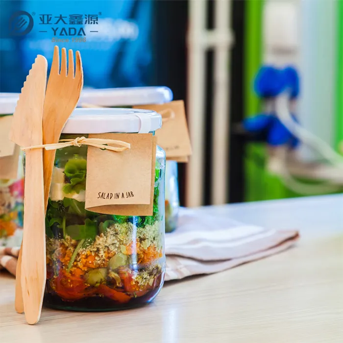 Retail display of private-label wooden cutlery packs