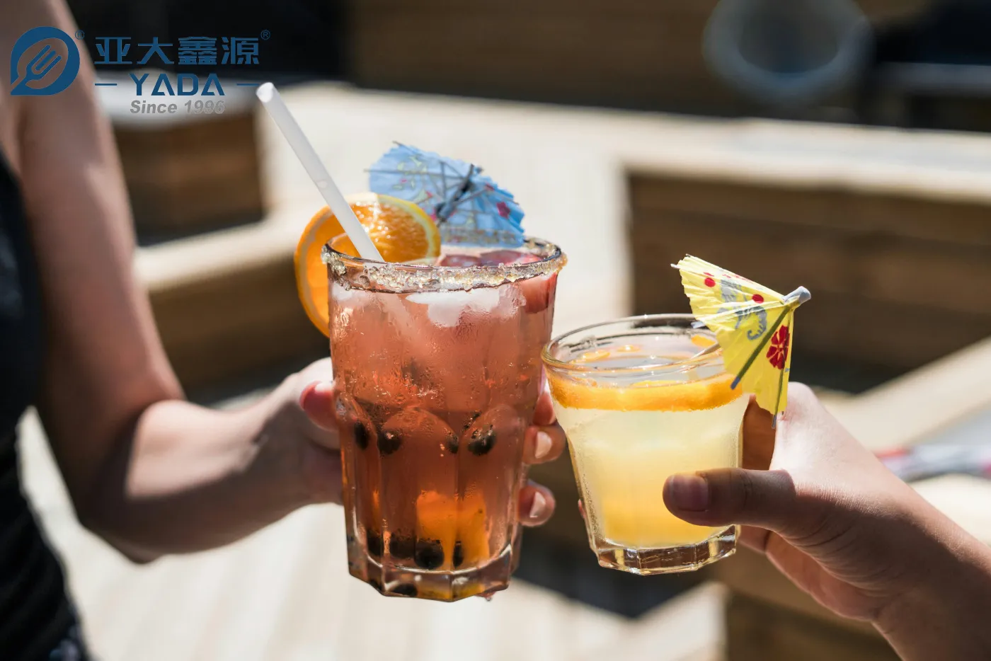 Wooden toothpicks in use with iced drinks and citrus fruit