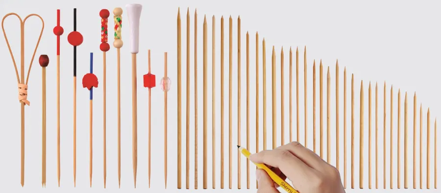 Mixed wooden cutlery assortment assembled into a branded kit