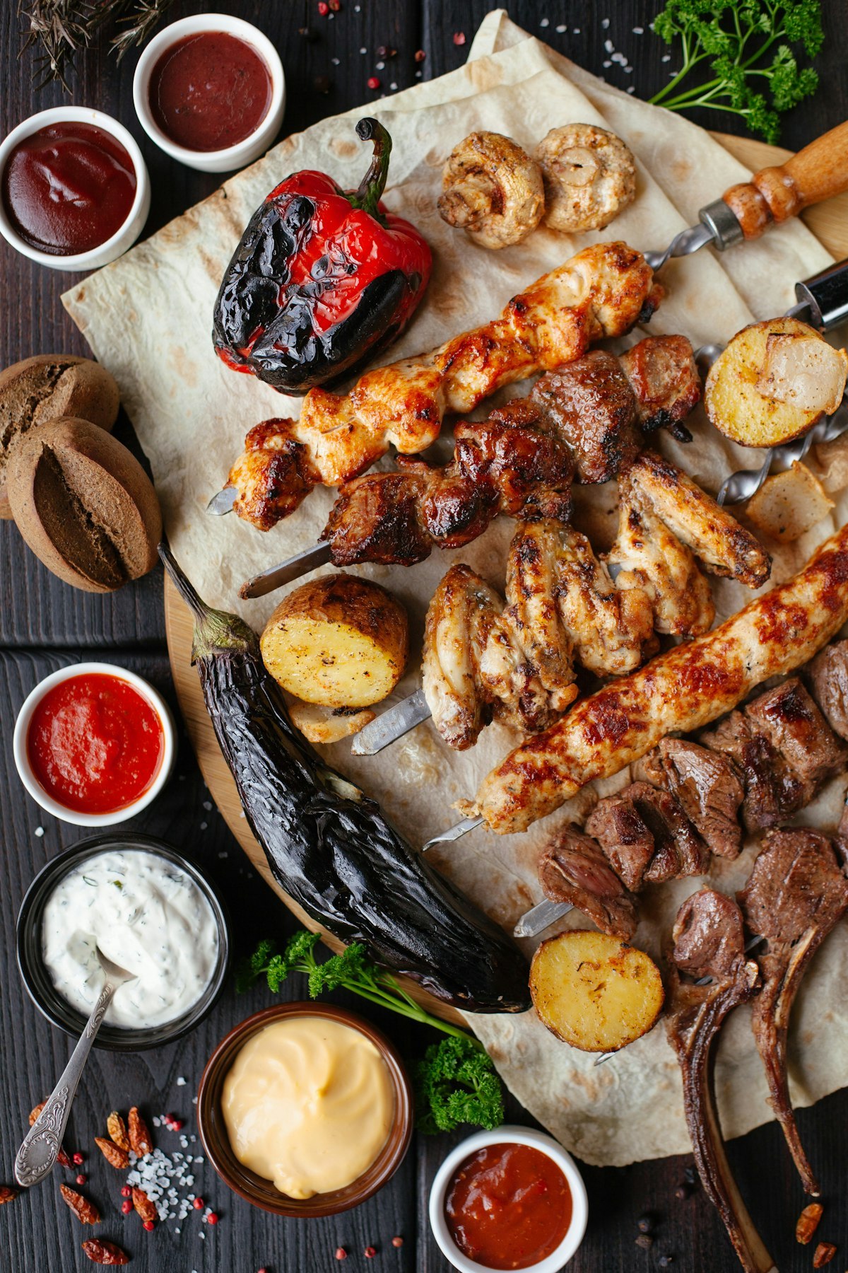 Wooden BBQ skewers and grilling accessories for foodservice