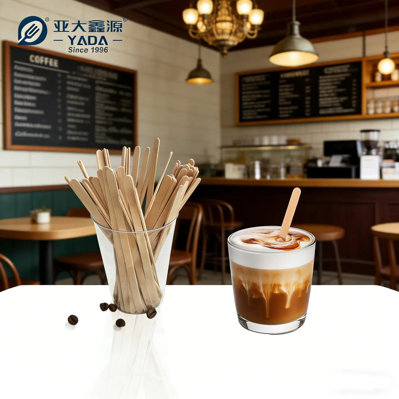 Wooden coffee stirrers in use at a cafe counter with an iced coffee