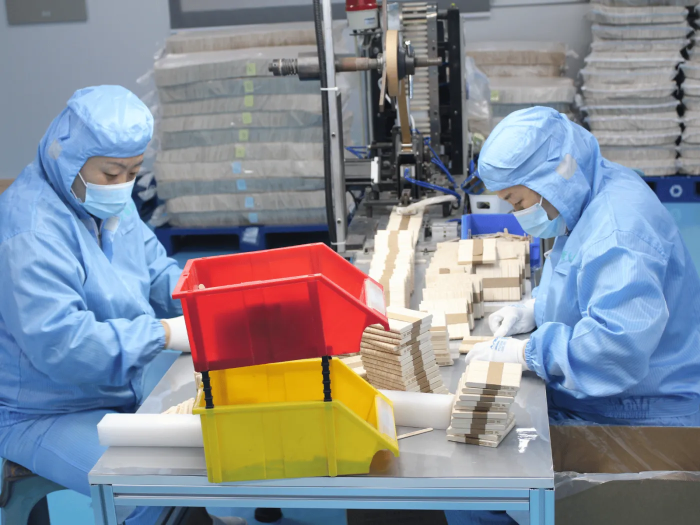 Wooden and bamboo tableware in production on a YADA manufacturing line