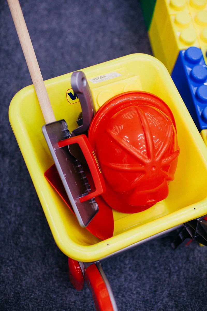 Children playing safely with wooden toys