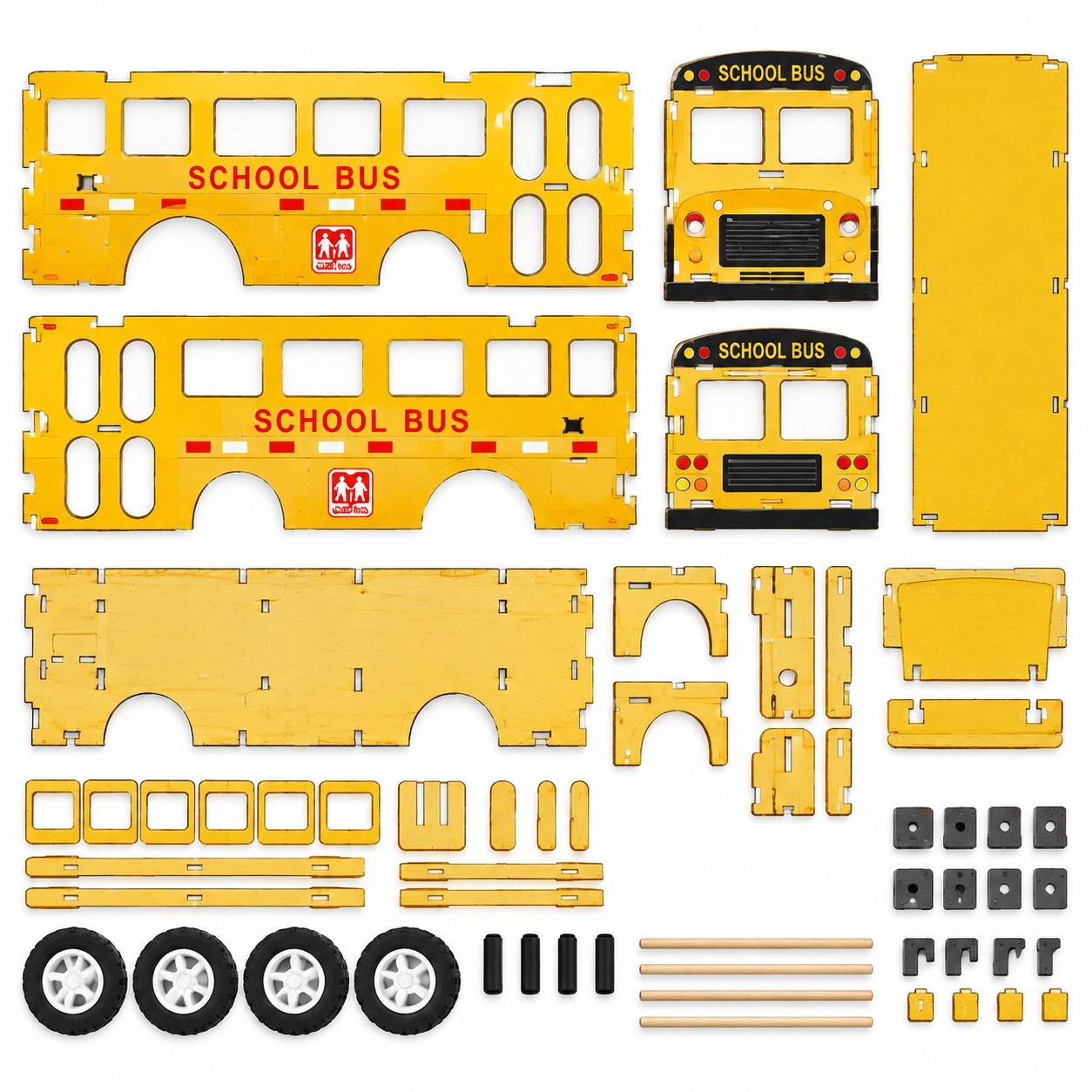 Laser-cut school bus parts and wooden wheels laid out for assembly