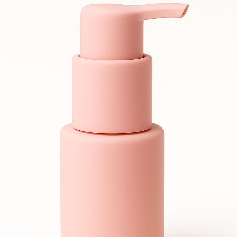 Durable cosmetic pump with silicone overmolding