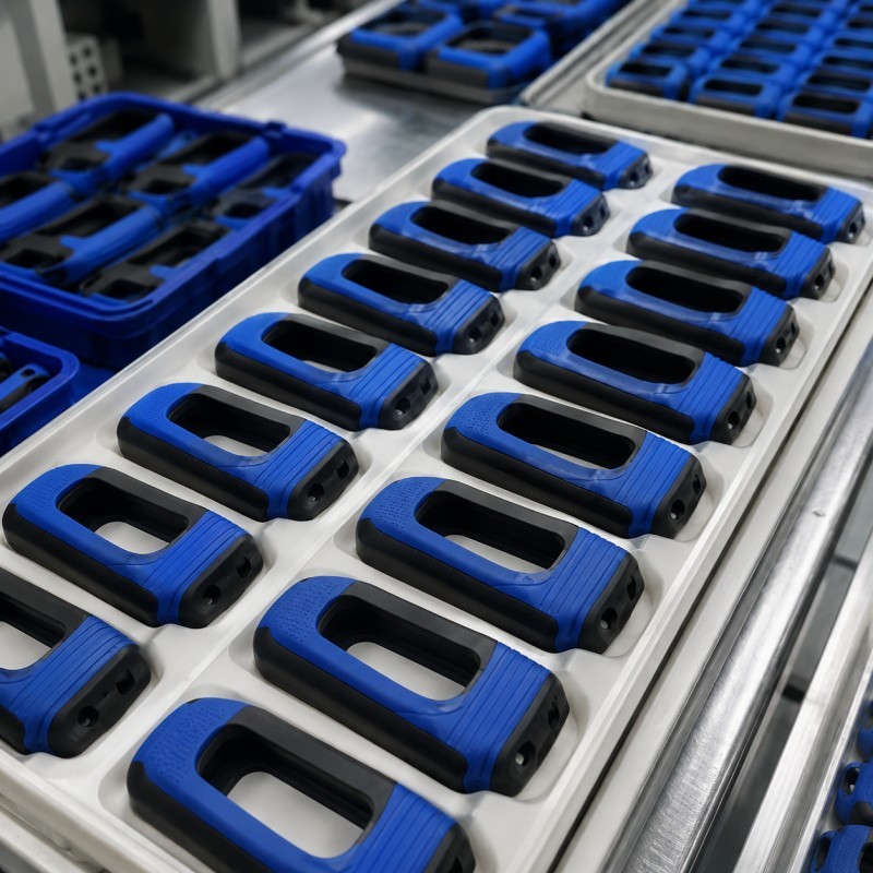 Custom silicone over plastic mass production