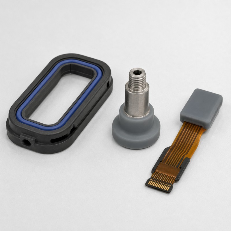Silicone over plastic metal and FPC components