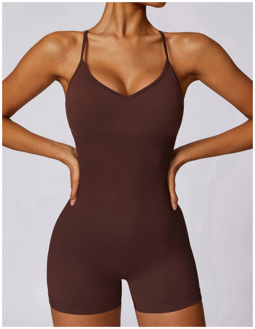 Custom fitness jumpsuit| Factory Wholesale Women's Hollow Back Seamless Yoga Tight Slimming and Hip Lifting Fitness Jumpsuit