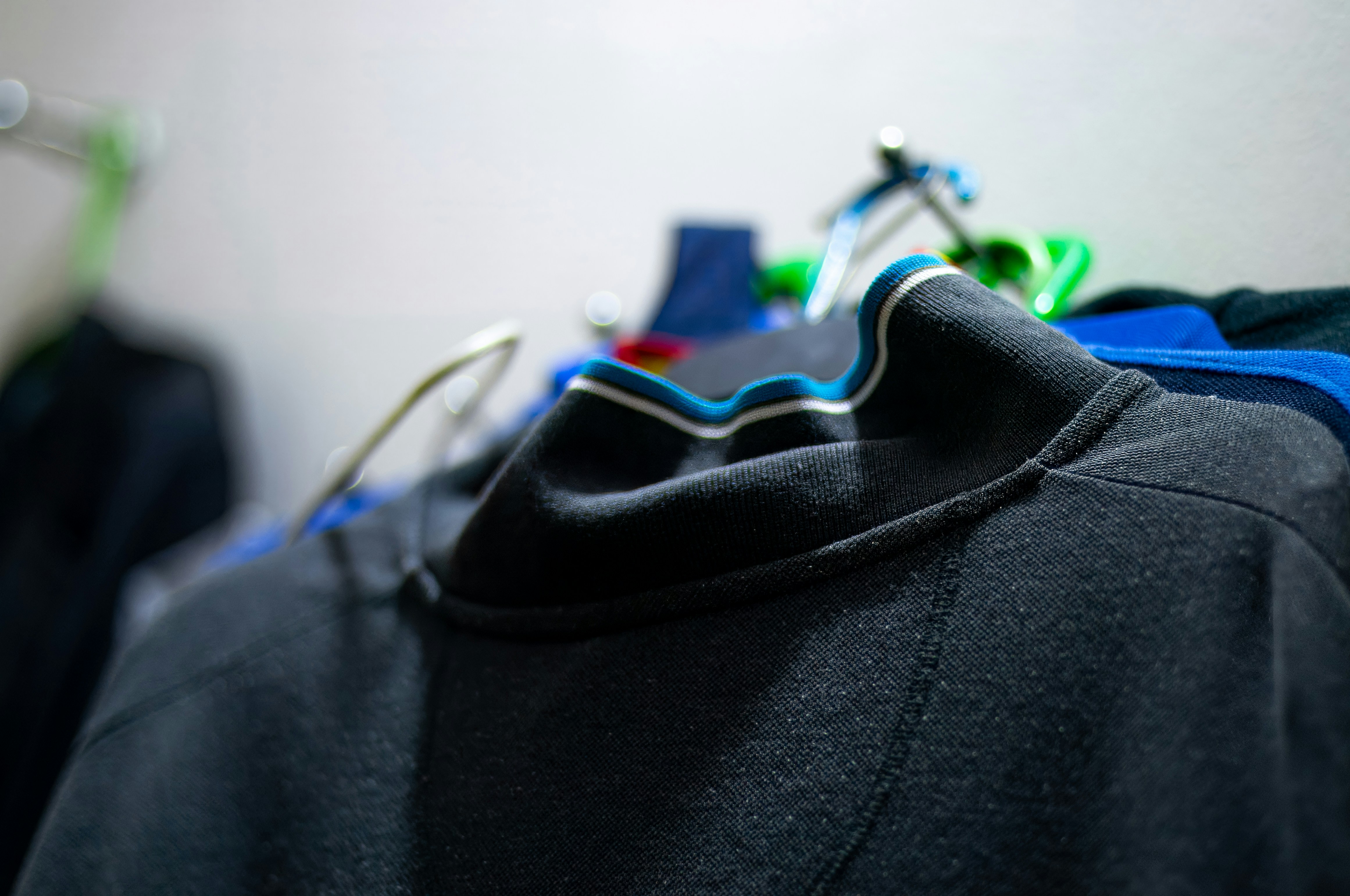 Various sportswear customization options, including fabric swatches, colorful threads, and printing examples.