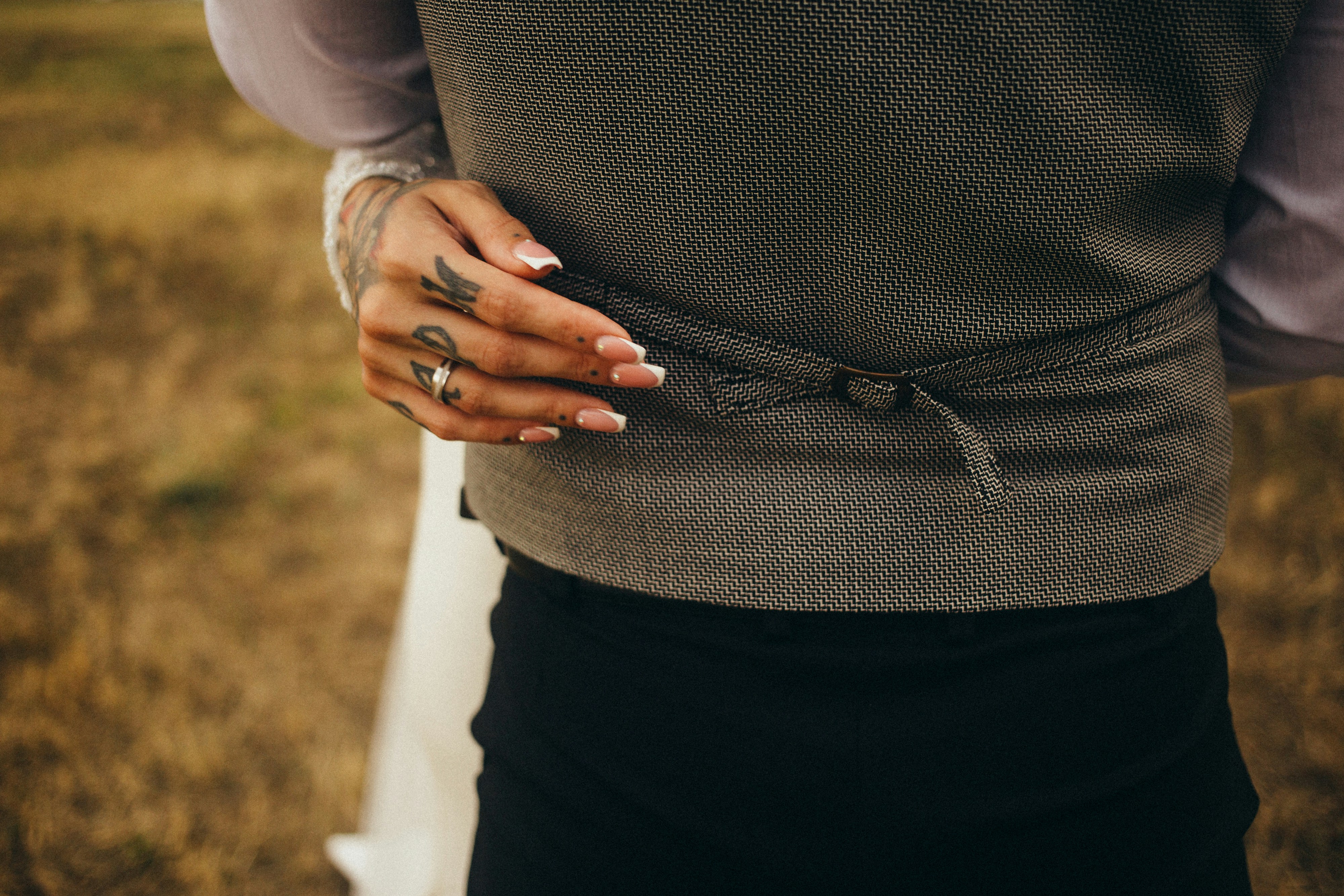 A woman layering different pieces of modest activewear