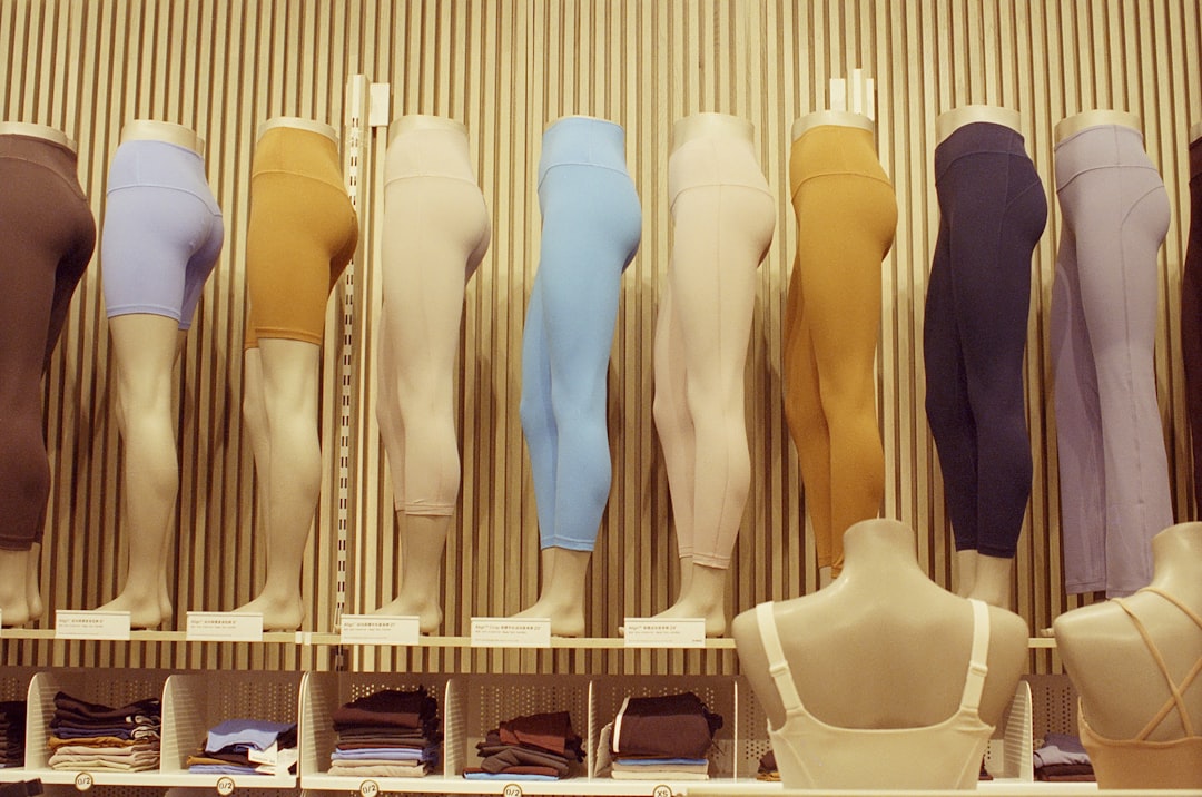A collection of custom yoga bras in various colors and styles