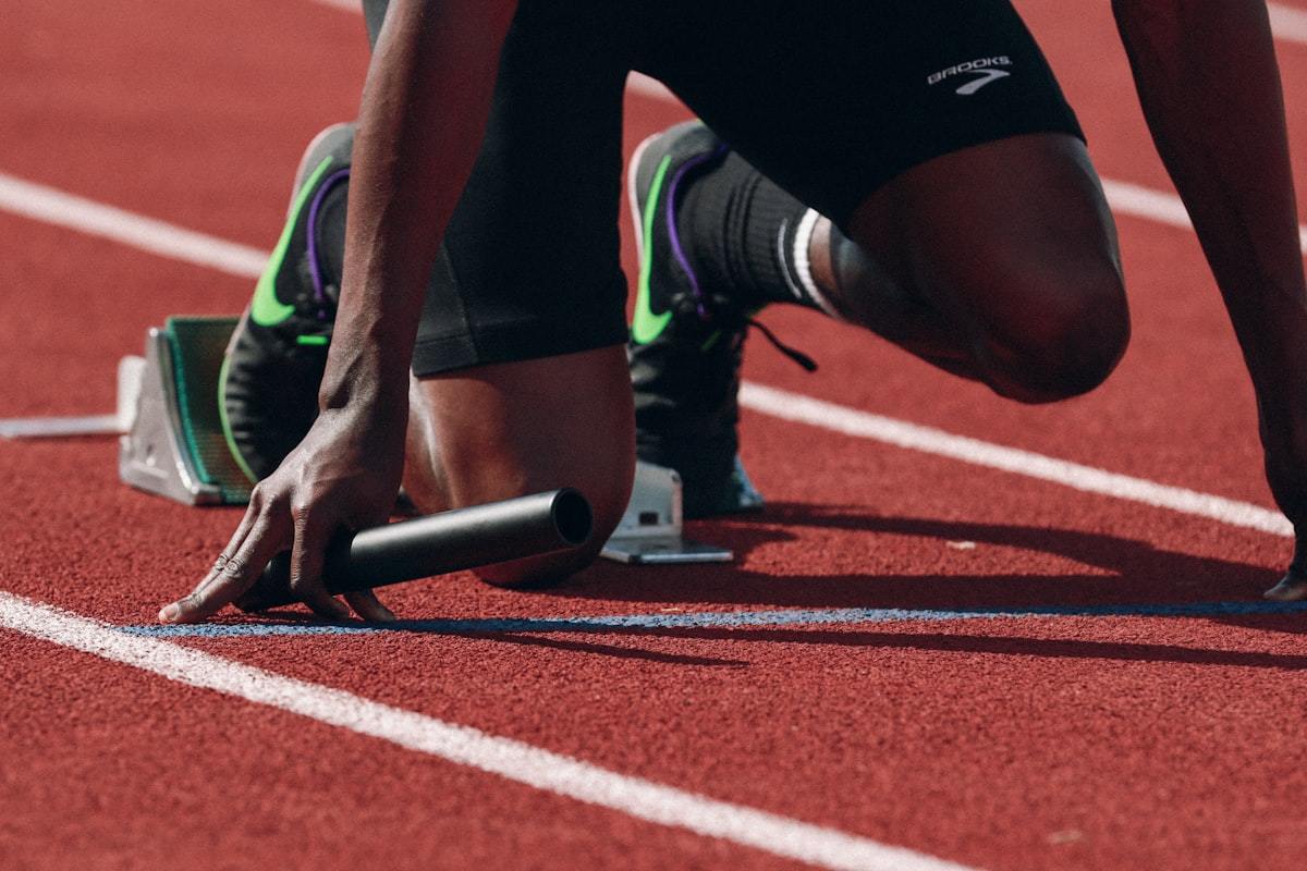 Runner in motion wearing athletic shorts