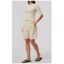 Custom Yoga Sets|Supplier of  Two-piece yoga set featuring a half-sleeve top and butt-lifting short