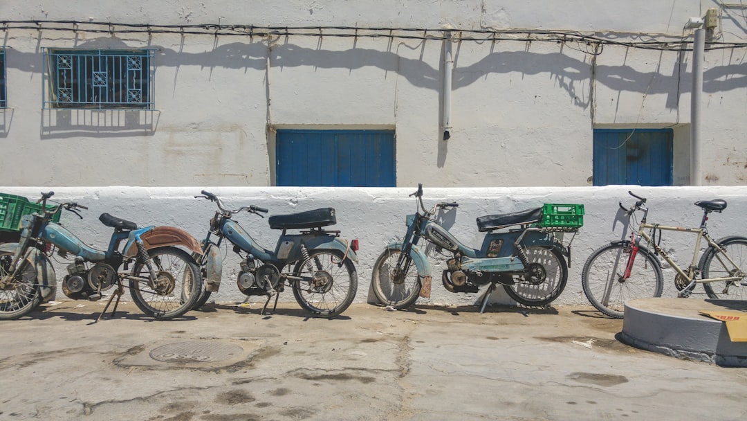 A lineup of various electric dirt bikes
