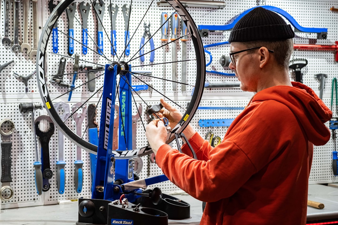 A technician conducting quality control checks on a finished e-bike