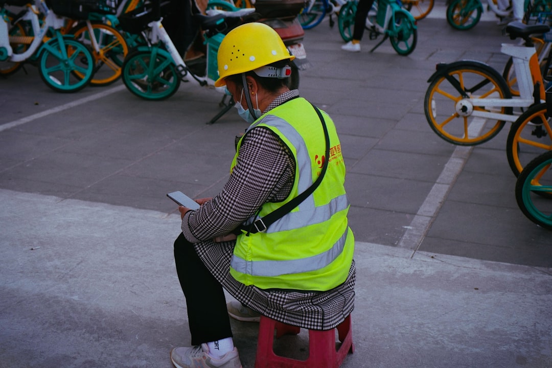 An inspector performing a final quality check on a finished e-bike