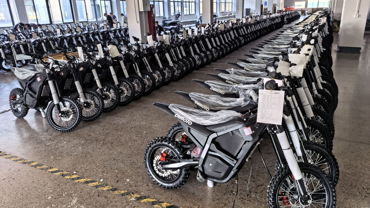 CEMOTO wholesale electric dirt bikes ready on the production floor for dealer orders