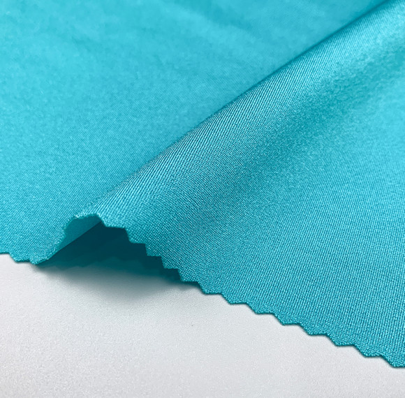 Nylon shiny double-draw fabric, nylon ribbed four-way stretch soft, suitable for swimwear, sportswear, gymnastic wear.