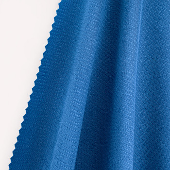 Sport fabric with double-sided laminated breathable perforations