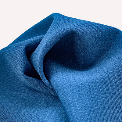 Sport fabric with double-sided laminated breathable perforations