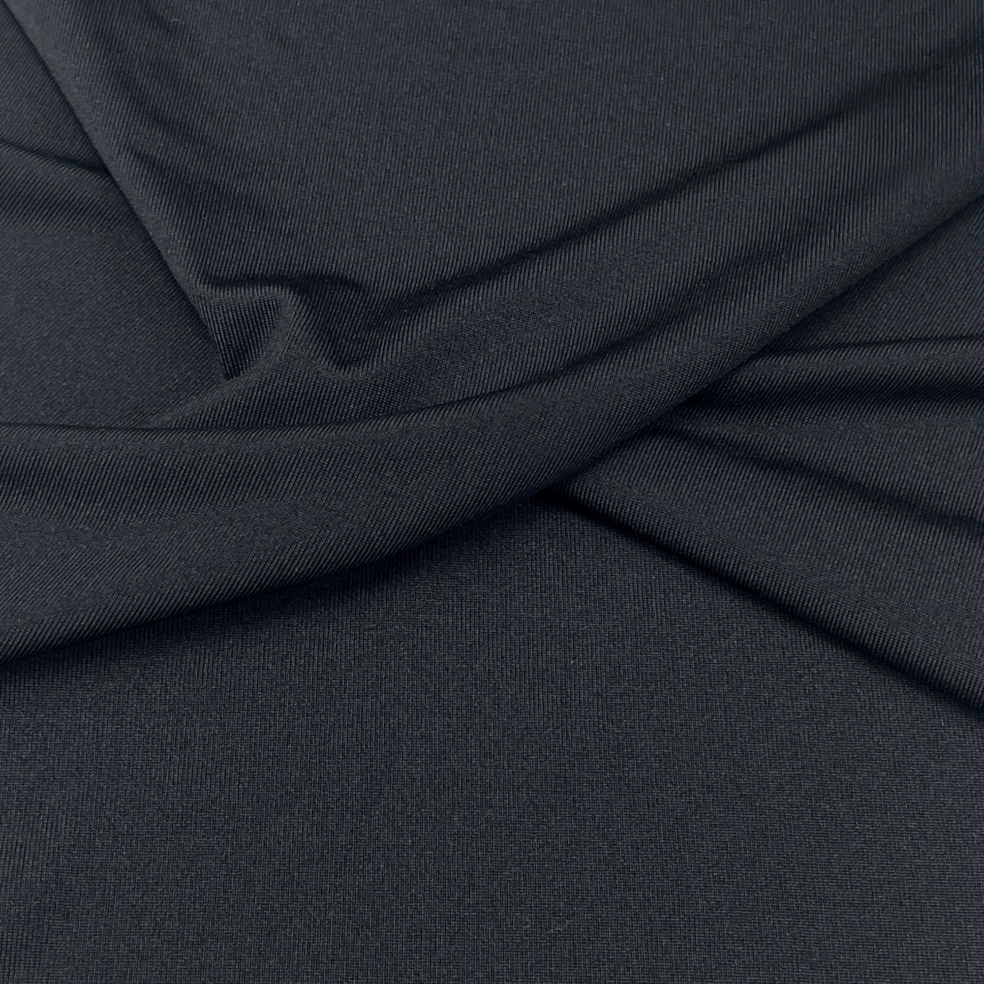 Close-up of smooth black stretch knit fabric, AIR-ICY high elastic functional sportswear textile from Faybric