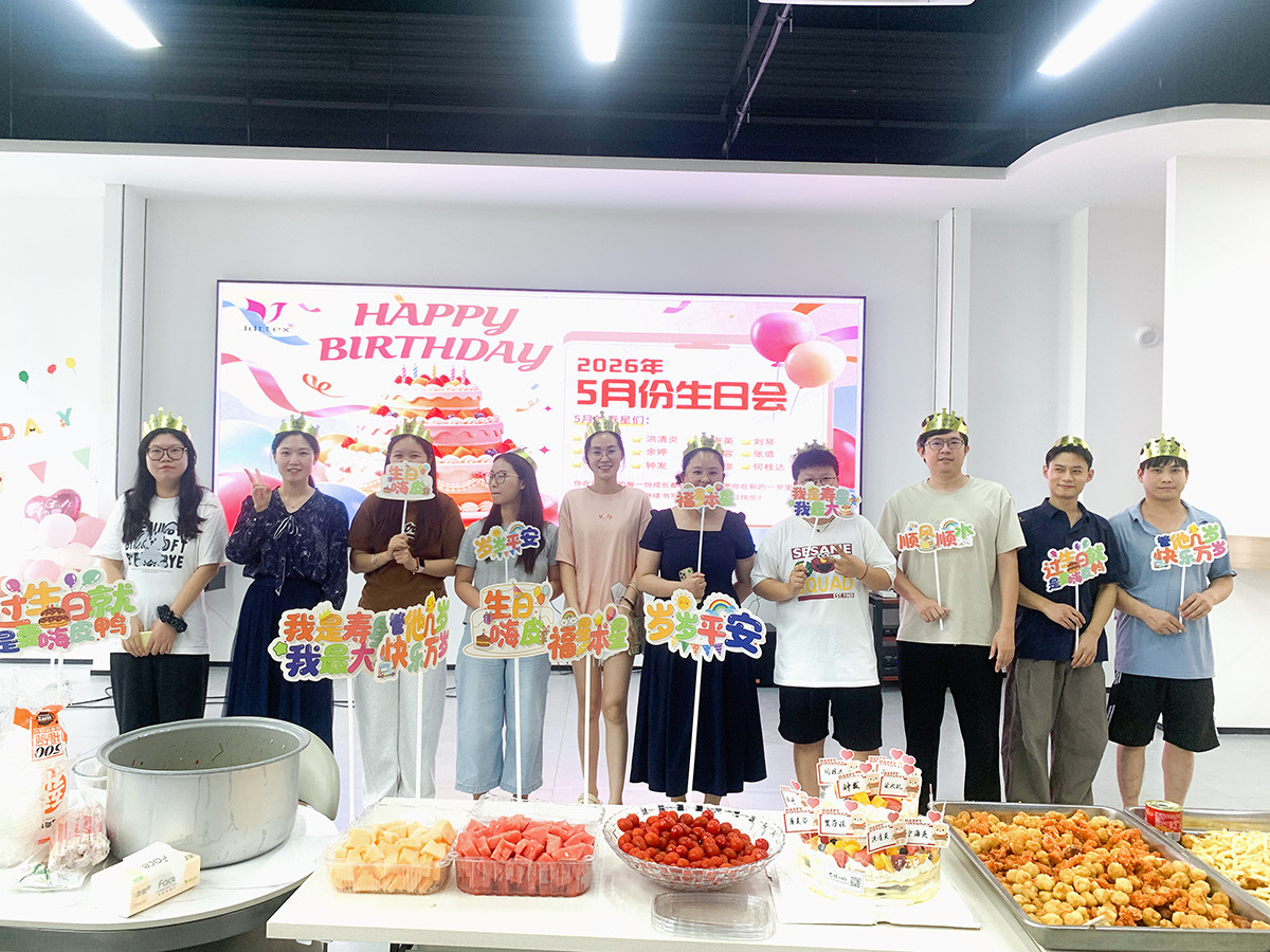 Company staff group photo at monthly employee birthday party, warm corporate team building & enterprise culture scene with birthday cake, fruits and snacks