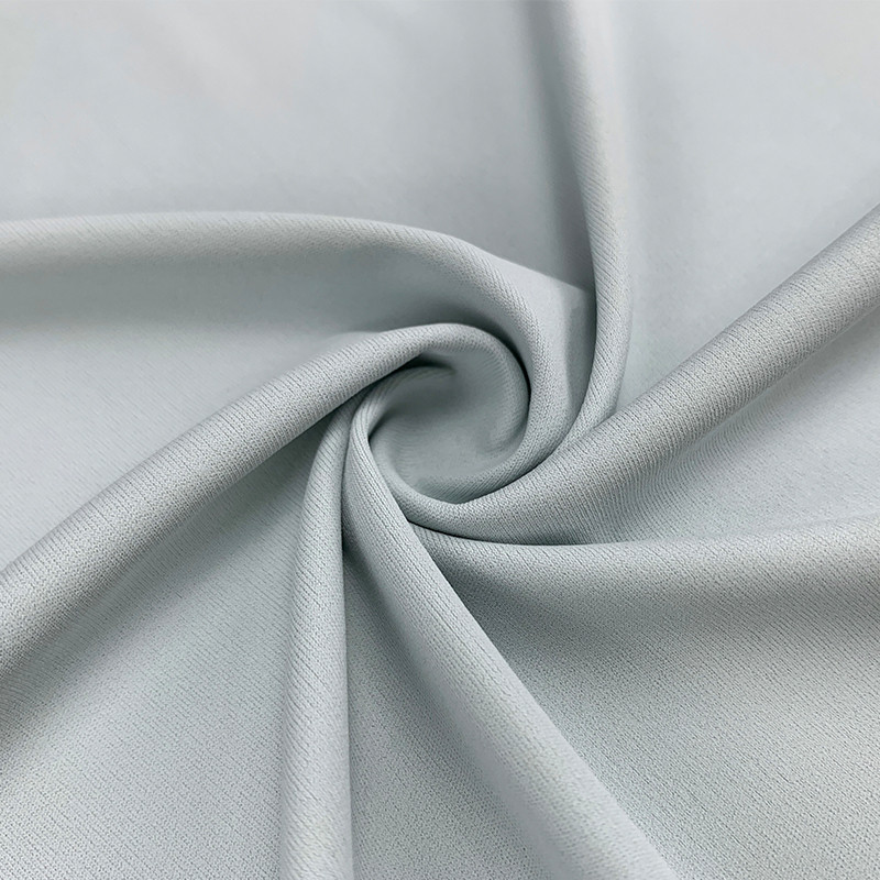 Light gray AIR-ICY functional cool touch knit fabric, soft stretch sportswear textile for yoga and activewear, Faybric functional fabric close-up texture