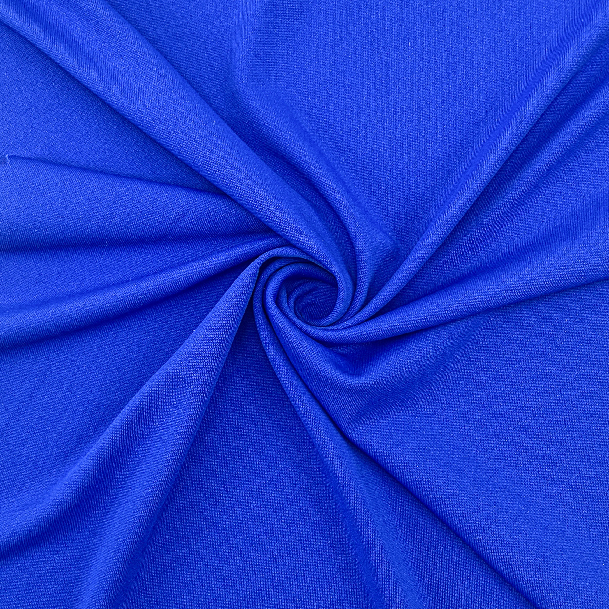 Twisted close-up of vibrant royal blue stretch knit fabric, Faybric AIR-ICY soft elastic functional sportswear textile