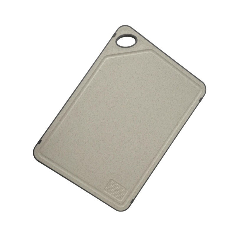 Titanium cutting board with vegetables and chef knife