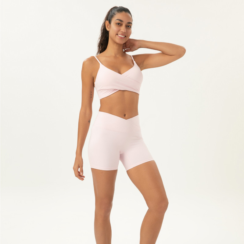 Black longline mesh sports bra with wide straps and mesh panels