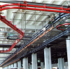 The Advantage of Overhead Conveyor Chains in Package and Assembly Line Systems