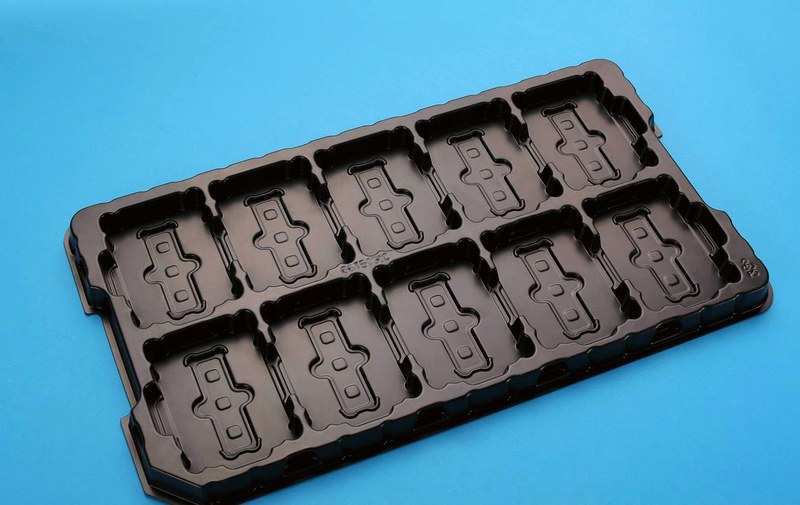 Industrial manufacturing facility for thermoformed plastic tray production