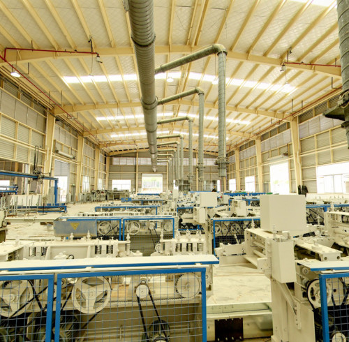 QL uses smart dispensing tech in its pretreatment line to boost bamboo and coffee stirrer quality.