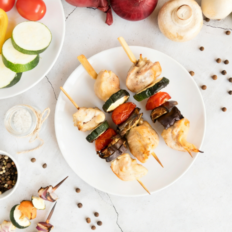 Food on bamboo paddle skewers