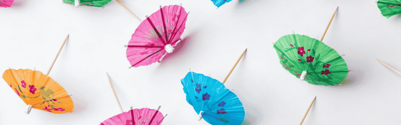 Colorful paper drink umbrellas with bamboo toothpicks