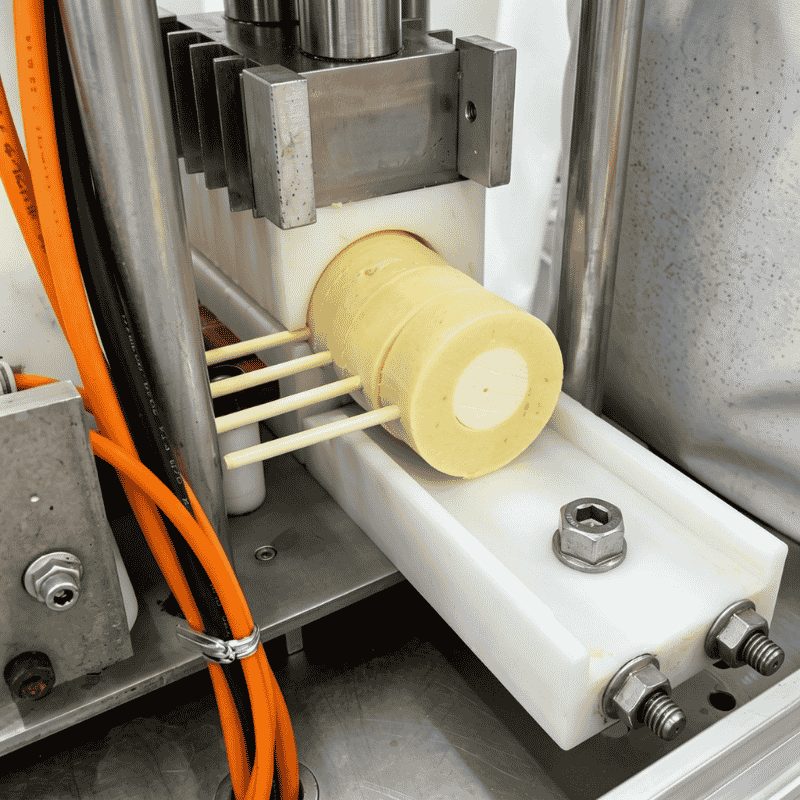 Automatic insertion of bamboo lolly sticks