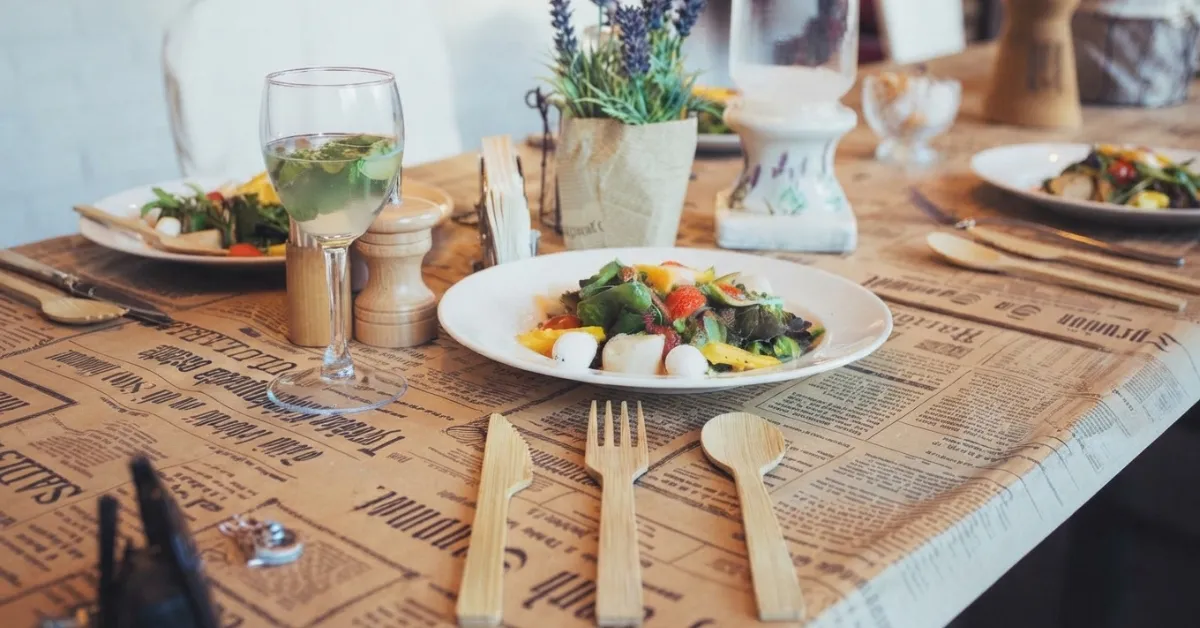 Bamboo cutlery set placed on a restaurant table ready for food service