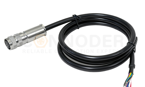 What is the purpose of applying heat shrink tubing to the connection point of the connector?