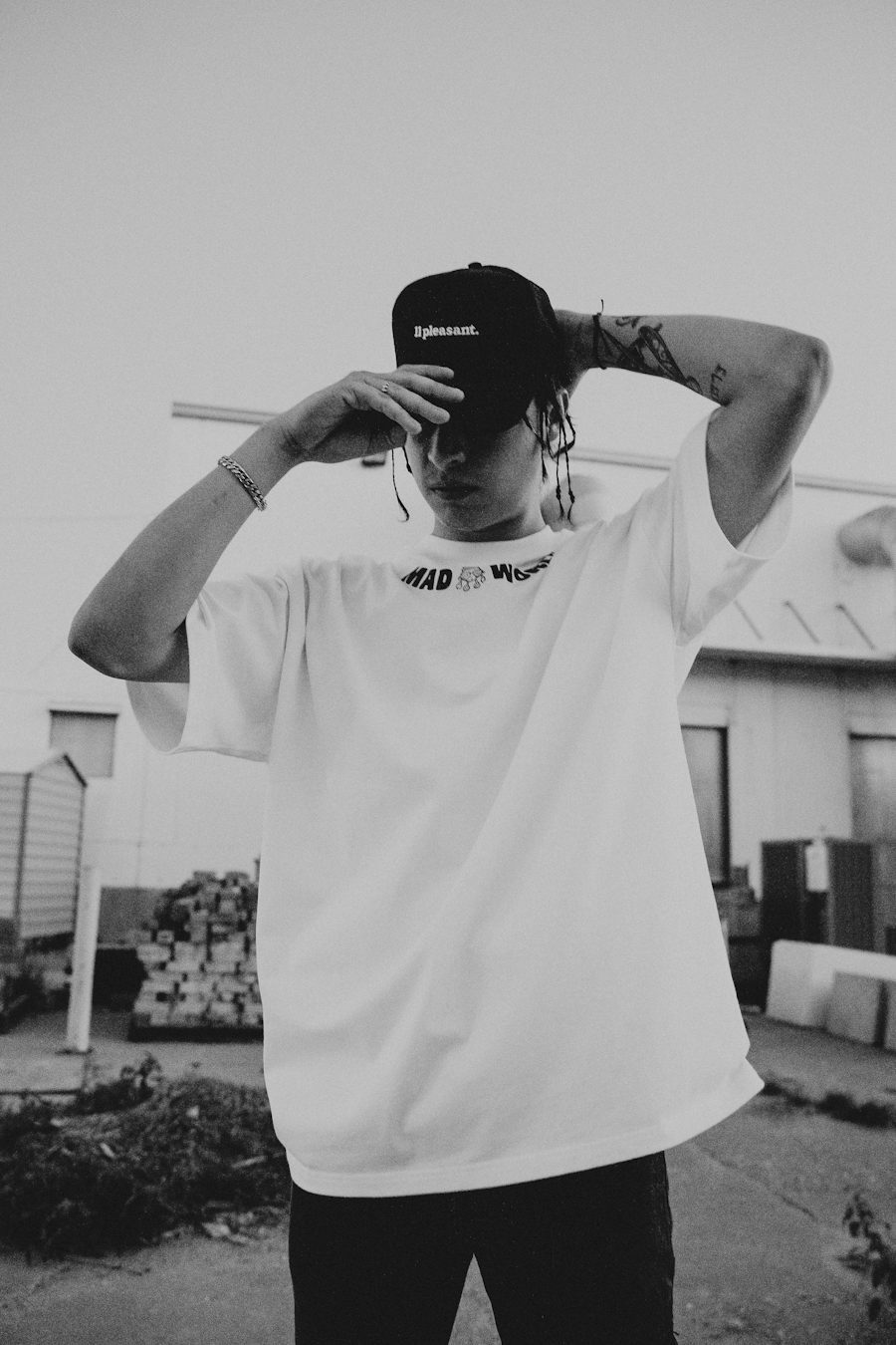 Streetwear model wearing a casual layered outfit