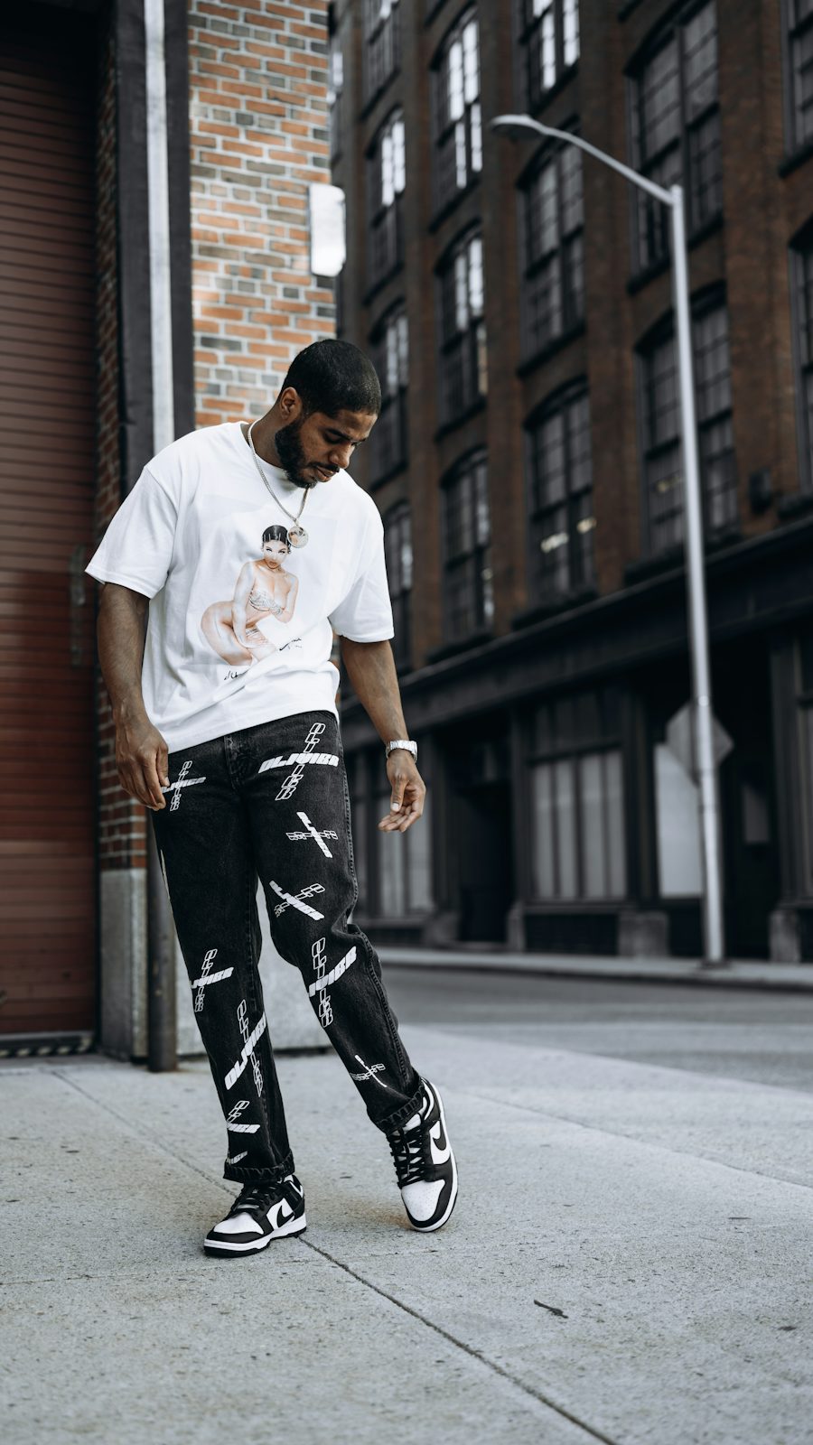 Streetwear look shown outdoors