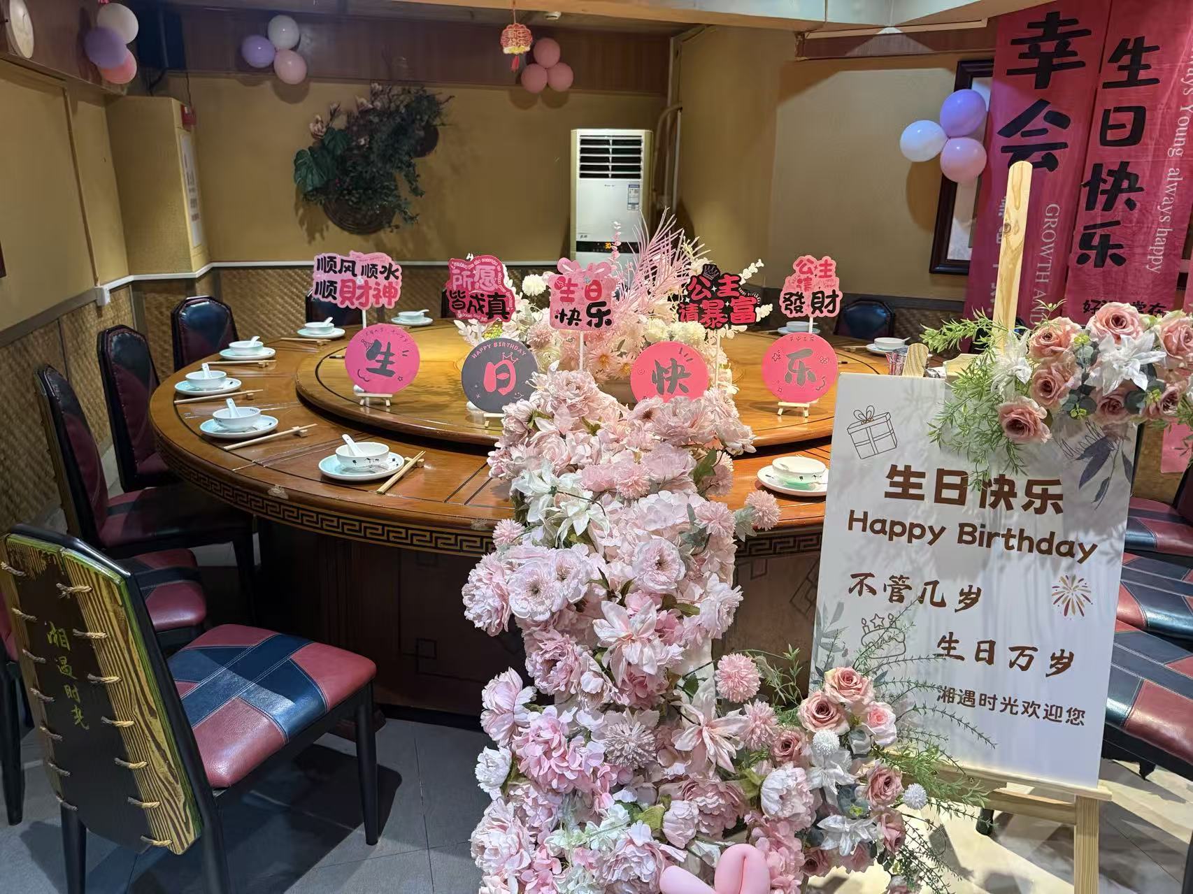 Birthday celebration table set for the Chanjoye team at a restaurant