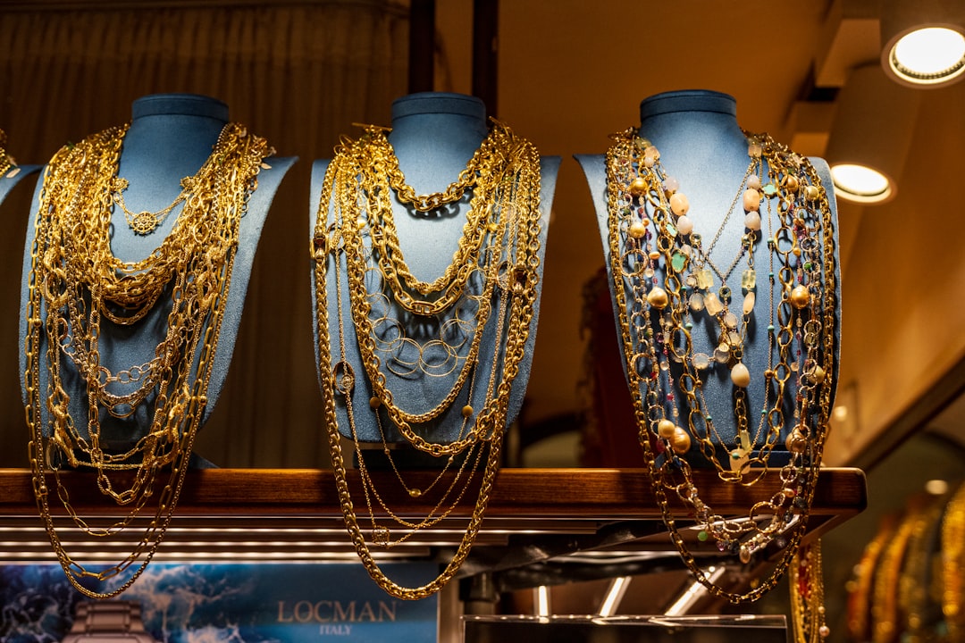 A collection of finished wholesale sterling silver necklaces and rings displayed neatly.