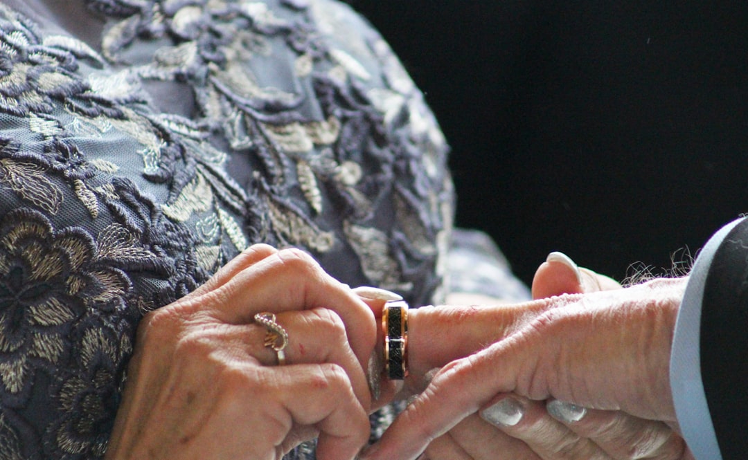 A jewelry designer reviewing sterling silver pieces at a workshop