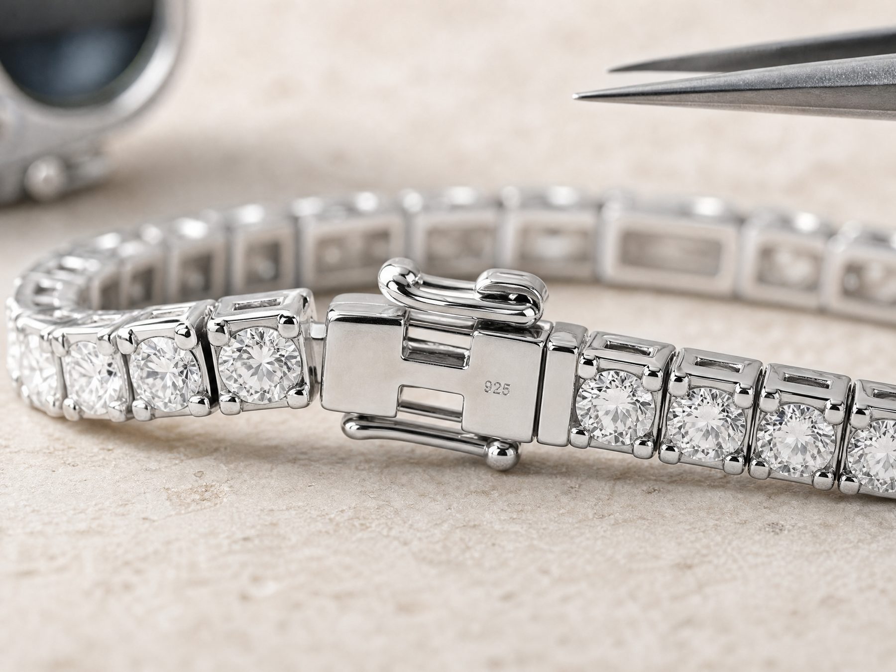 925 hallmark and clasp inspection points on a sterling silver tennis bracelet