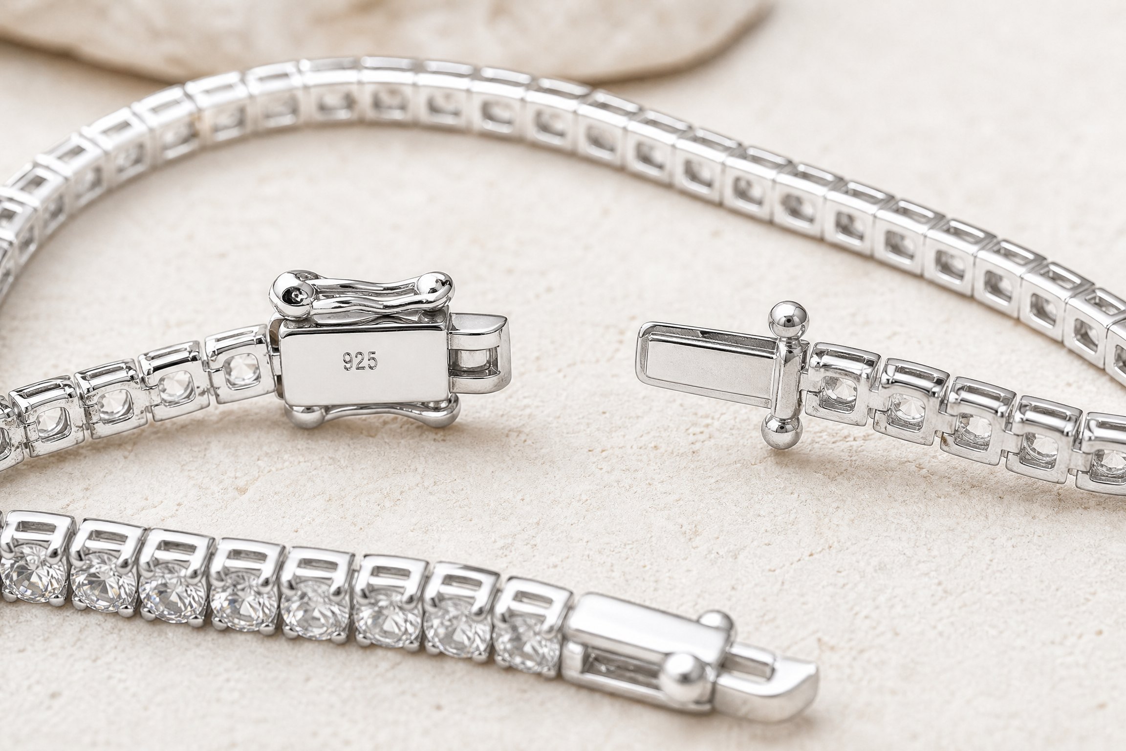 925 mark and clasp detail on a sterling silver tennis bracelet