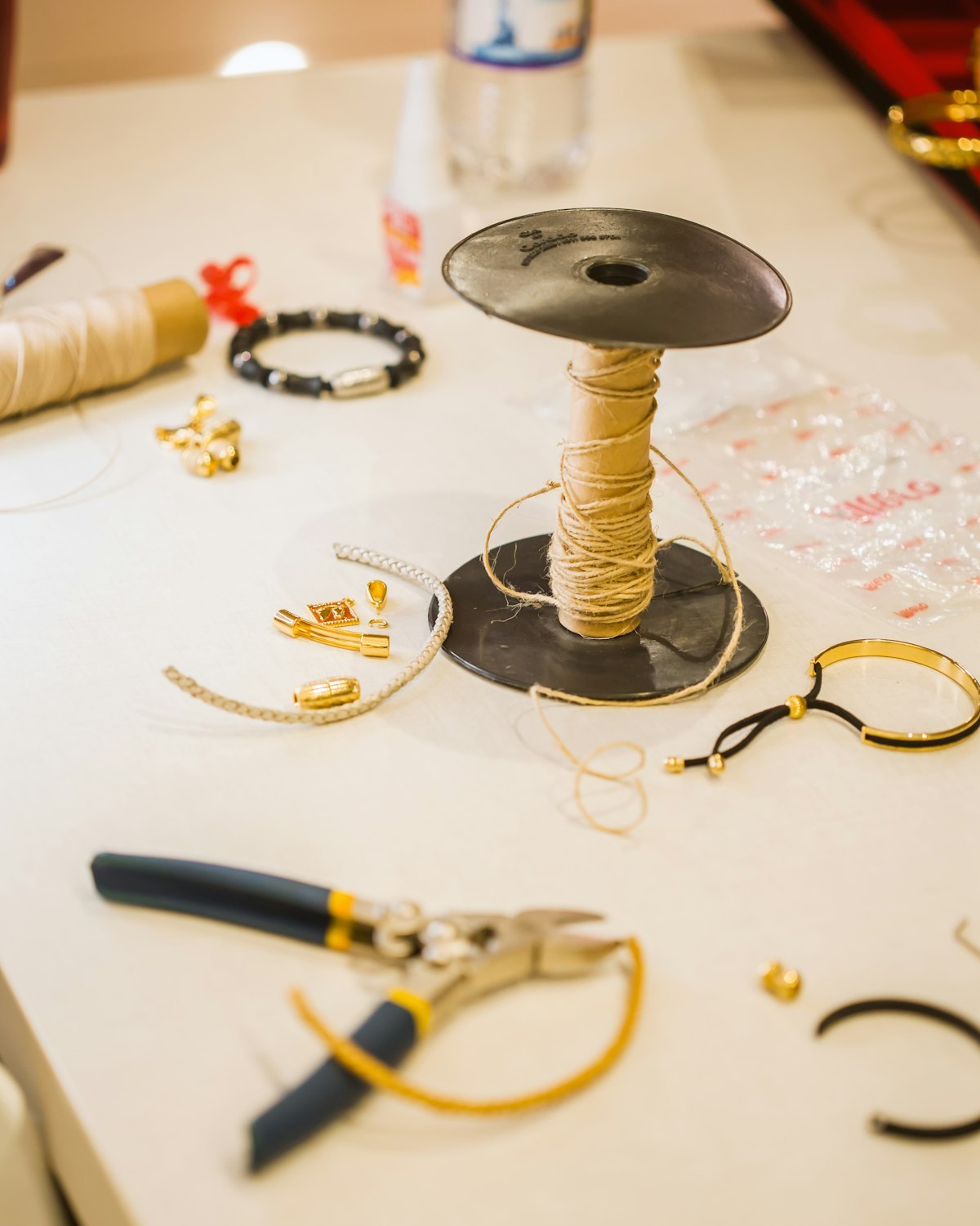 Jewelry tools and components on a workshop table
